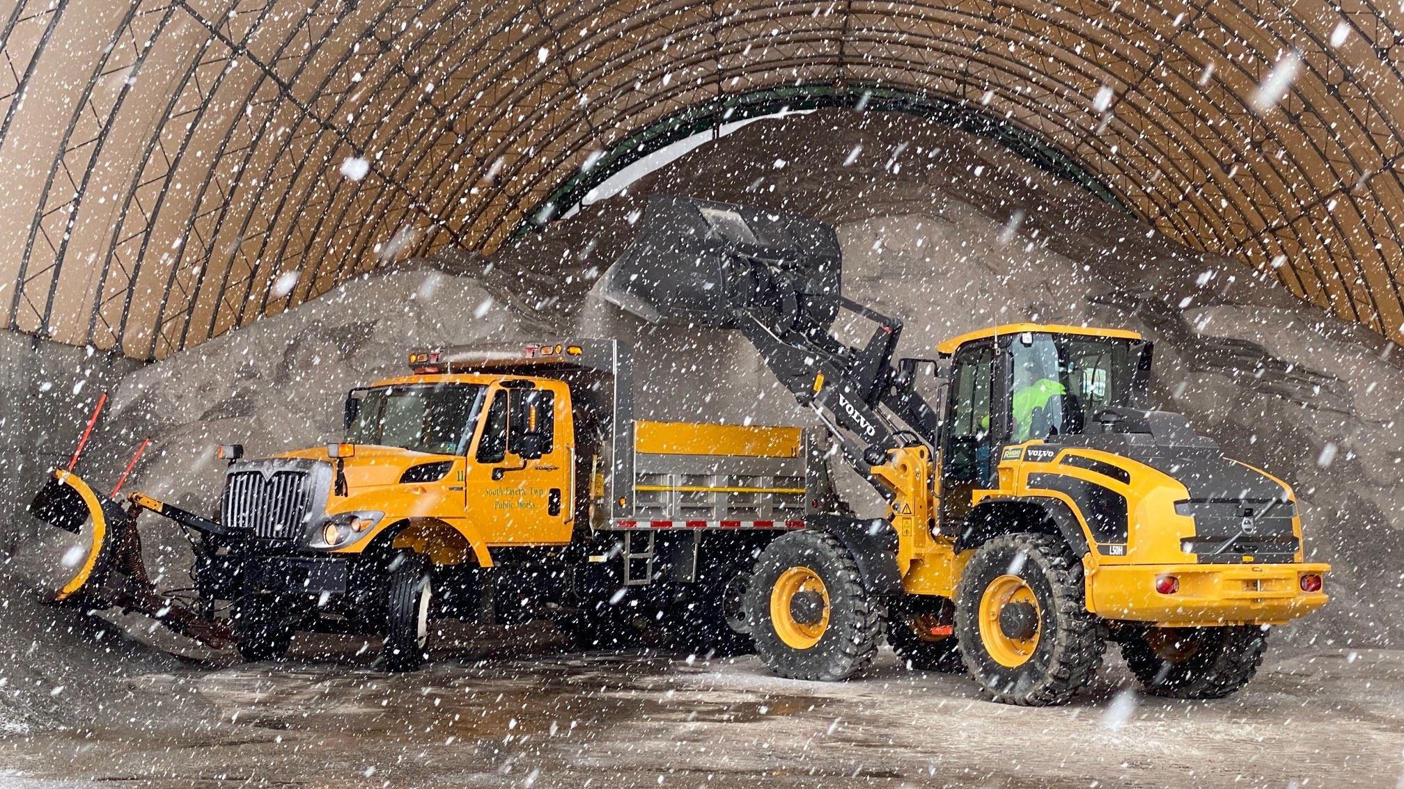 Plow truck being loaded with road salt 2020