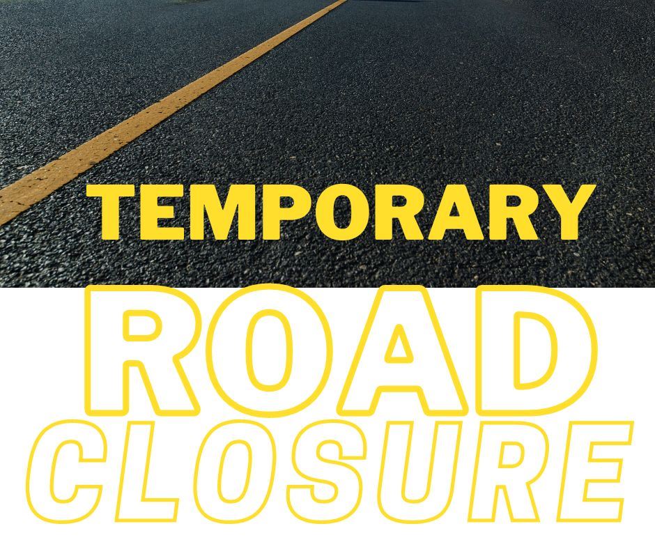 Temporary Road Closure with yellow road stripe